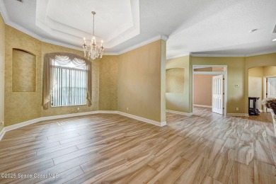 Discover the perfect blend of space, style, and location in this on Crane Creek Reserve Golf Club in Florida - for sale on GolfHomes.com, golf home, golf lot