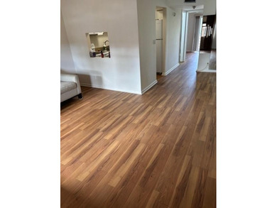 Welcome to easy living in the desirable Sunrise Lakes 55+ on Sunrise Lakes Phase III in Florida - for sale on GolfHomes.com, golf home, golf lot