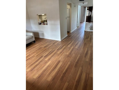 Welcome to easy living in the desirable Sunrise Lakes 55+ on Sunrise Lakes Phase III in Florida - for sale on GolfHomes.com, golf home, golf lot