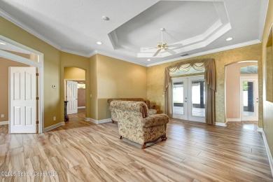 Discover the perfect blend of space, style, and location in this on Crane Creek Reserve Golf Club in Florida - for sale on GolfHomes.com, golf home, golf lot