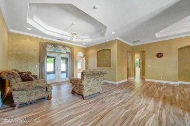 Discover the perfect blend of space, style, and location in this on Crane Creek Reserve Golf Club in Florida - for sale on GolfHomes.com, golf home, golf lot