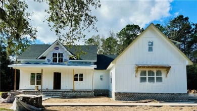 NEW CONSTRUCTED HOME BY COASTAL HAVEN HOMES AND PROPERTIES, SET on Sapelo Hammock Golf Club in Georgia - for sale on GolfHomes.com, golf home, golf lot