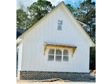 NEW CONSTRUCTED HOME BY COASTAL HAVEN HOMES AND PROPERTIES, SET on Sapelo Hammock Golf Club in Georgia - for sale on GolfHomes.com, golf home, golf lot