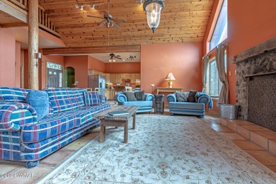 Enjoy the rustic cabin feel of this home after a day of fun on Silver Creek Golf Club in Arizona - for sale on GolfHomes.com, golf home, golf lot