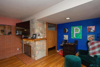 Cheerful, warm and inviting, this unique home is brimming with on Spring River Golf Course in New Mexico - for sale on GolfHomes.com, golf home, golf lot