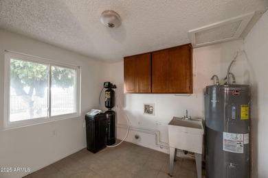 Beautifully updated 3 bed, 2 bath single-level home with nearly on Arizona Golf Resort and Conference Center in Arizona - for sale on GolfHomes.com, golf home, golf lot