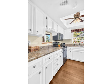 Beautifully updated and move-in ready, this 2-bedroom, 2-bath on Highland Lakes Executive Golf Course in Florida - for sale on GolfHomes.com, golf home, golf lot