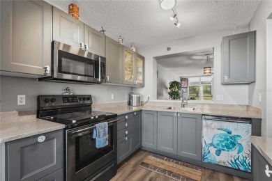 This beautifully updated first-floor condo in The Woods at on Pinebrook/Ironwood Golf Course in Florida - for sale on GolfHomes.com, golf home, golf lot