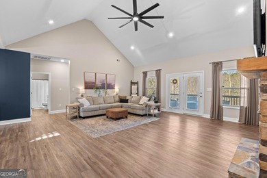 Tucked away just steps from Jackson Lake, this beautifully on Turtle Cove Golf Course in Georgia - for sale on GolfHomes.com, golf home, golf lot