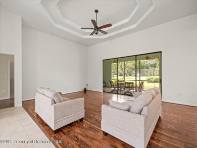 Located in Glen Lakes, this 2006 Lindhorst Custom Classique is on Glen Lakes Country Club in Florida - for sale on GolfHomes.com, golf home, golf lot