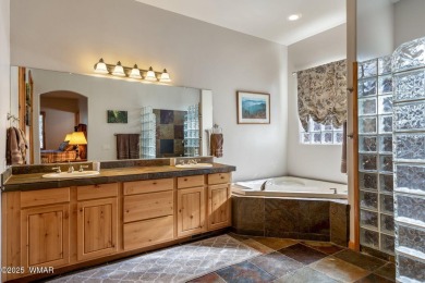 Nestled in a secluded oasis, this alluring residence offers both on Torreon Golf Club in Arizona - for sale on GolfHomes.com, golf home, golf lot