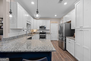 Tucked away just steps from Jackson Lake, this beautifully on Turtle Cove Golf Course in Georgia - for sale on GolfHomes.com, golf home, golf lot