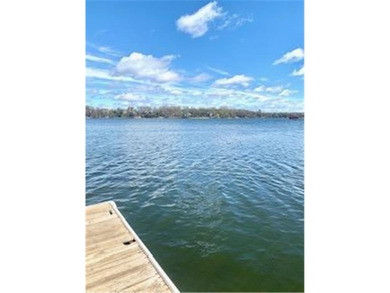 Multi-level walkout townhome with mature pine tree privacy on Deer Run Golf Club in Minnesota - for sale on GolfHomes.com, golf home, golf lot