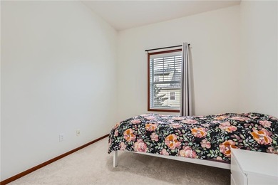 Multi-level walkout townhome with mature pine tree privacy on Deer Run Golf Club in Minnesota - for sale on GolfHomes.com, golf home, golf lot