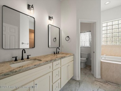 Located in Glen Lakes, this 2006 Lindhorst Custom Classique is on Glen Lakes Country Club in Florida - for sale on GolfHomes.com, golf home, golf lot