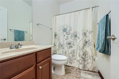 Multi-level walkout townhome with mature pine tree privacy on Deer Run Golf Club in Minnesota - for sale on GolfHomes.com, golf home, golf lot