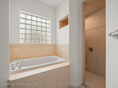 Located in Glen Lakes, this 2006 Lindhorst Custom Classique is on Glen Lakes Country Club in Florida - for sale on GolfHomes.com, golf home, golf lot