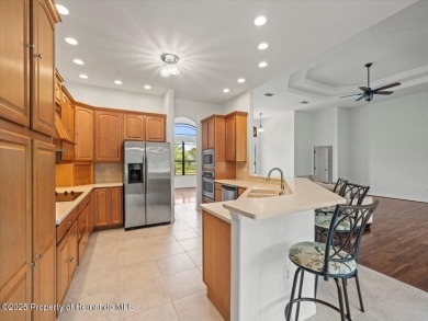 Located in Glen Lakes, this 2006 Lindhorst Custom Classique is on Glen Lakes Country Club in Florida - for sale on GolfHomes.com, golf home, golf lot