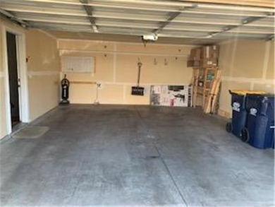 Multi-level walkout townhome with mature pine tree privacy on Deer Run Golf Club in Minnesota - for sale on GolfHomes.com, golf home, golf lot