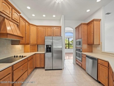 Located in Glen Lakes, this 2006 Lindhorst Custom Classique is on Glen Lakes Country Club in Florida - for sale on GolfHomes.com, golf home, golf lot
