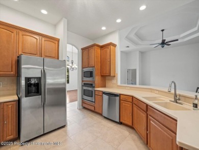 Located in Glen Lakes, this 2006 Lindhorst Custom Classique is on Glen Lakes Country Club in Florida - for sale on GolfHomes.com, golf home, golf lot