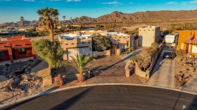 Nestled in the serene Foothills, this stunning custom-built home on Foothills Executive Golf Course in Arizona - for sale on GolfHomes.com, golf home, golf lot