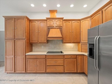 Located in Glen Lakes, this 2006 Lindhorst Custom Classique is on Glen Lakes Country Club in Florida - for sale on GolfHomes.com, golf home, golf lot