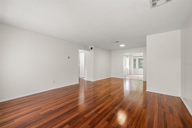 Welcome home to this updated, move-in ready Palm Harbor retreat on Highland Lakes Executive Golf Course in Florida - for sale on GolfHomes.com, golf home, golf lot