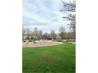 Multi-level walkout townhome with mature pine tree privacy on Deer Run Golf Club in Minnesota - for sale on GolfHomes.com, golf home, golf lot