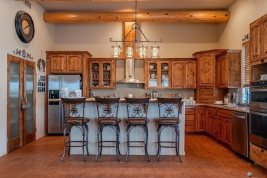 Nestled in the serene Foothills, this stunning custom-built home on Foothills Executive Golf Course in Arizona - for sale on GolfHomes.com, golf home, golf lot