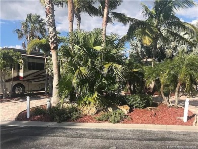 Nestled in the prestigious *millionaires row,* this magnificent on Motorcoach Resort Golf Course in Florida - for sale on GolfHomes.com, golf home, golf lot