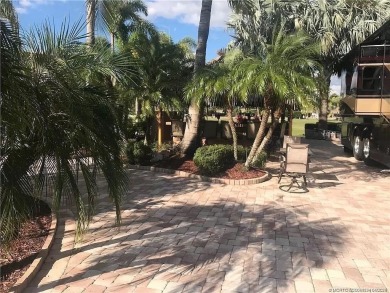 Nestled in the prestigious *millionaires row,* this magnificent on Motorcoach Resort Golf Course in Florida - for sale on GolfHomes.com, golf home, golf lot