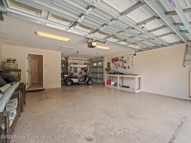 Located in Glen Lakes, this 2006 Lindhorst Custom Classique is on Glen Lakes Country Club in Florida - for sale on GolfHomes.com, golf home, golf lot