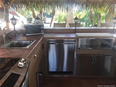 Nestled in the prestigious *millionaires row,* this magnificent on Motorcoach Resort Golf Course in Florida - for sale on GolfHomes.com, golf home, golf lot