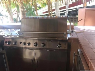 Nestled in the prestigious *millionaires row,* this magnificent on Motorcoach Resort Golf Course in Florida - for sale on GolfHomes.com, golf home, golf lot