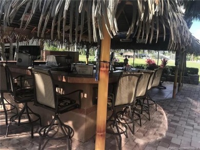 Nestled in the prestigious *millionaires row,* this magnificent on Motorcoach Resort Golf Course in Florida - for sale on GolfHomes.com, golf home, golf lot