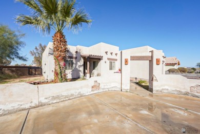 Beautiful Santa Fe style home on the golf course in Somerton on Cocopah Rio Colorado Golf Course in Arizona - for sale on GolfHomes.com, golf home, golf lot