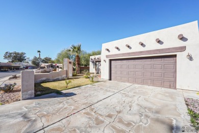 Beautiful Santa Fe style home on the golf course in Somerton on Cocopah Rio Colorado Golf Course in Arizona - for sale on GolfHomes.com, golf home, golf lot