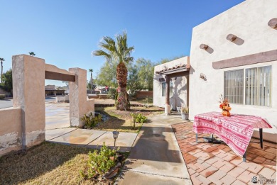 Beautiful Santa Fe style home on the golf course in Somerton on Cocopah Rio Colorado Golf Course in Arizona - for sale on GolfHomes.com, golf home, golf lot