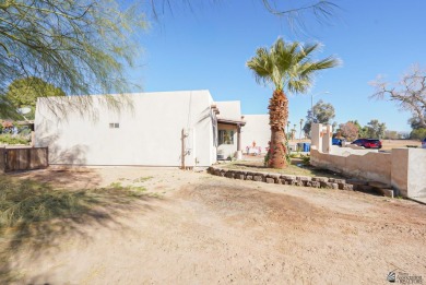 Beautiful Santa Fe style home on the golf course in Somerton on Cocopah Rio Colorado Golf Course in Arizona - for sale on GolfHomes.com, golf home, golf lot