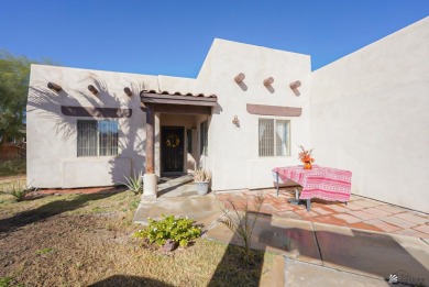 Beautiful Santa Fe style home on the golf course in Somerton on Cocopah Rio Colorado Golf Course in Arizona - for sale on GolfHomes.com, golf home, golf lot