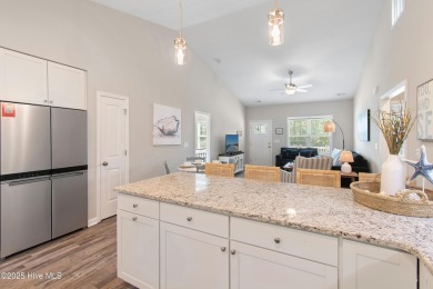 Welcome to 109 SW 17th Street, a beautiful home on pilings with on Founders Club At St. James Plantation in North Carolina - for sale on GolfHomes.com, golf home, golf lot