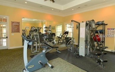 Welcome to this beautifully maintained 2-bedroom, 2-bathroom on ChampionsGate Golf Resort in Florida - for sale on GolfHomes.com, golf home, golf lot