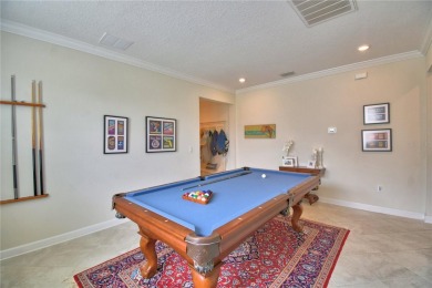 Located in the exclusive, gated community of ChampionsGate on The Oasis Club at Champions Gate in Florida - for sale on GolfHomes.com, golf home, golf lot