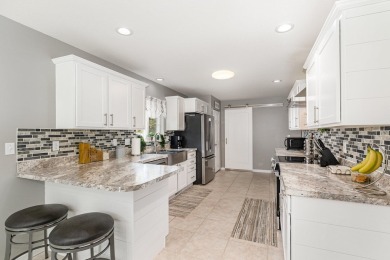 Lovely updated condo with full basement in the city of West on West Branch Country Club in Michigan - for sale on GolfHomes.com, golf home, golf lot