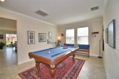 Located in the exclusive, gated community of ChampionsGate on The Oasis Club at Champions Gate in Florida - for sale on GolfHomes.com, golf home, golf lot