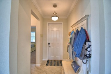 Located in the exclusive, gated community of ChampionsGate on The Oasis Club at Champions Gate in Florida - for sale on GolfHomes.com, golf home, golf lot