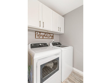 Lovely updated condo with full basement in the city of West on West Branch Country Club in Michigan - for sale on GolfHomes.com, golf home, golf lot