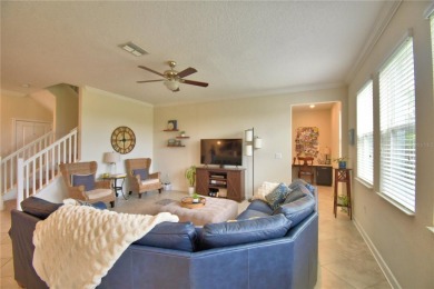 Located in the exclusive, gated community of ChampionsGate on The Oasis Club at Champions Gate in Florida - for sale on GolfHomes.com, golf home, golf lot