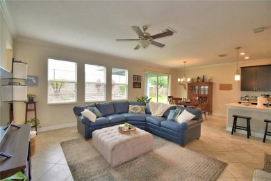 Located in the exclusive, gated community of ChampionsGate on The Oasis Club at Champions Gate in Florida - for sale on GolfHomes.com, golf home, golf lot